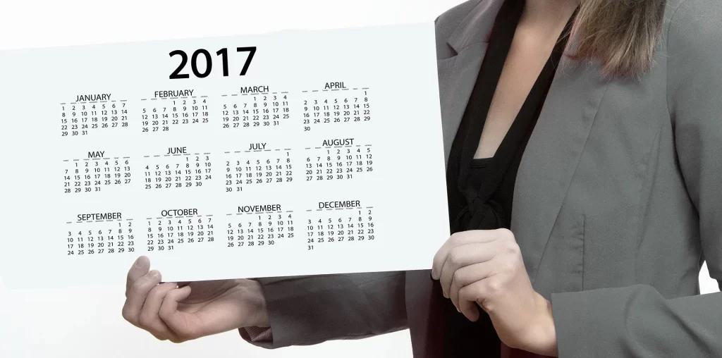 Een jaarkalender als hulpmiddel om maanddoelen, deadlines en bedrijfsactiviteiten overzichtelijk te plannen.