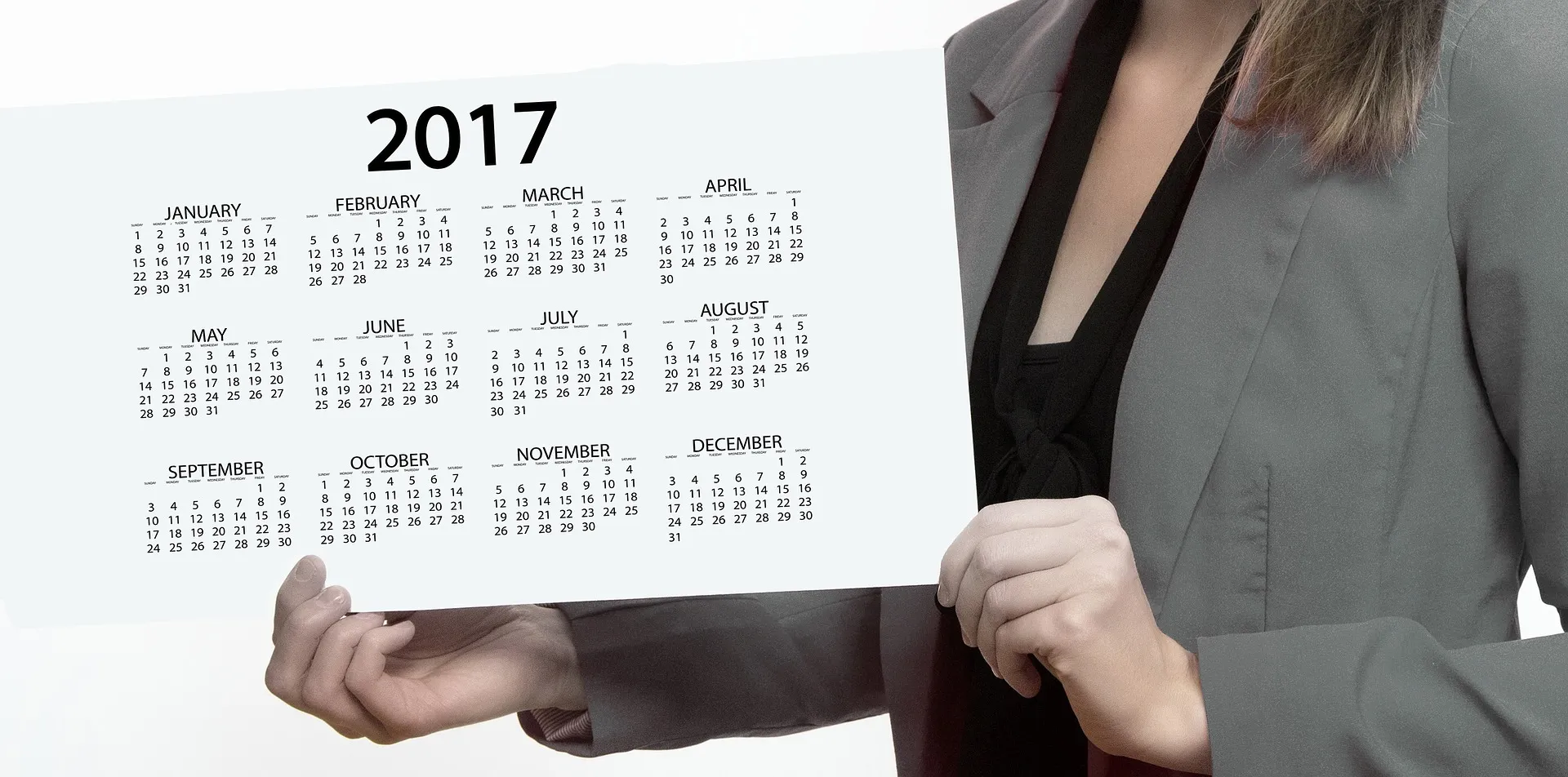Een jaarkalender als hulpmiddel om maanddoelen, deadlines en bedrijfsactiviteiten overzichtelijk te plannen.